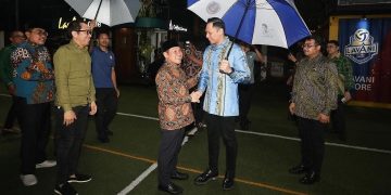 AHY Payungi Cak Imin Saat tiba di Cikeas// SS IG AHY