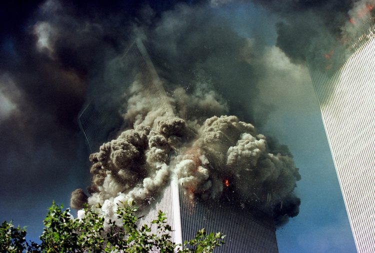 NEW YORK - SEPTEMBER 11:  The south tower of the World Trade Center collapses September 11, 2001 in New York City.  (Photo by Thomas Nilsson/ Getty Images)