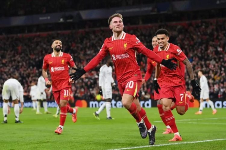 Selebrasi Alexis Mac Allister (tengah) setelah mencetak gol pembuka untuk Liverpool dalam pertandingan Liga Champions 2024/25 lawan Real Madrid di Stadion Anfield pada Kamis (28/11/2024).