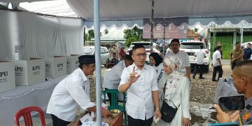Hasbi Jayabaya usai menyalurkan hak pilih di Pilkada 2024.(Def/SuaraNusantara)