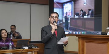 Anggota Komisi XII DPR RI Fraksi PDIP, Marinus Gea, saat menjalani sidang terbuka promosi doktor di Universitas Sumatera Utara (USU), pada Kamis, (8/1/2026) (Dok Suaranusantara)